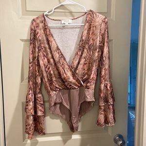 Ruffle sleeve pink snake skin bodysuit